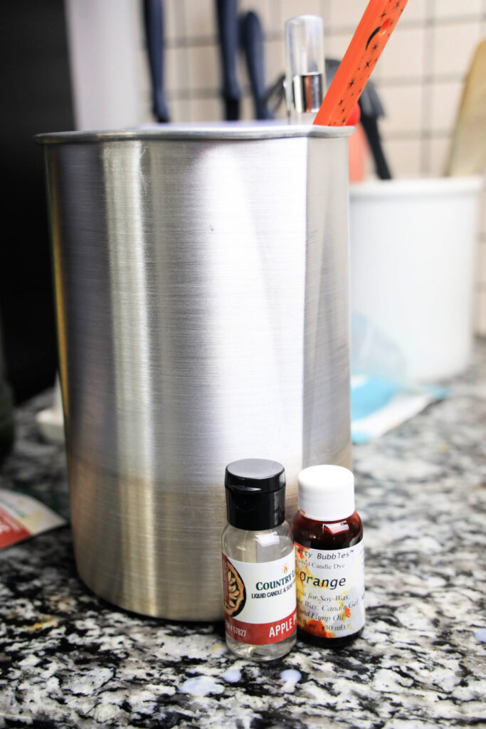 Metal container with fragrance oils displayed