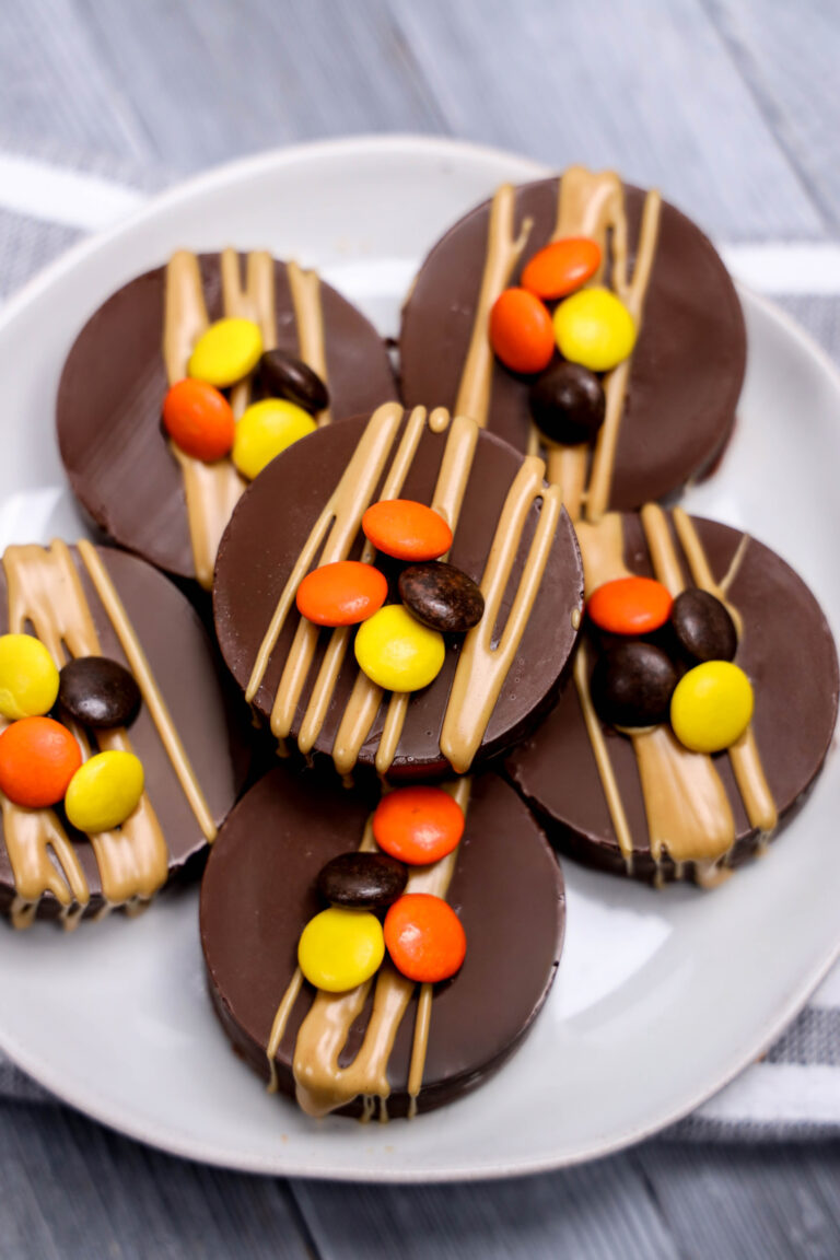 Chocolate cookies with colorful candies topping