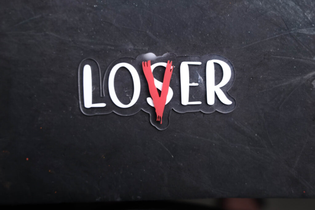 Sticker with 'LOSER' text design  IT Wreath