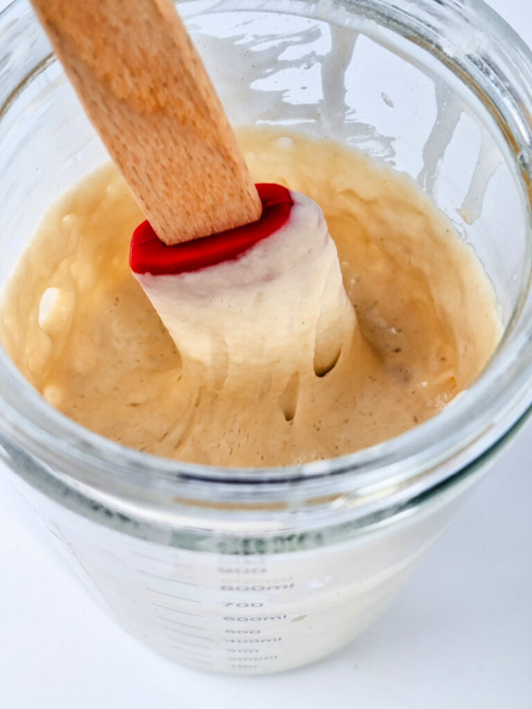 Thick sourdough starter in jar