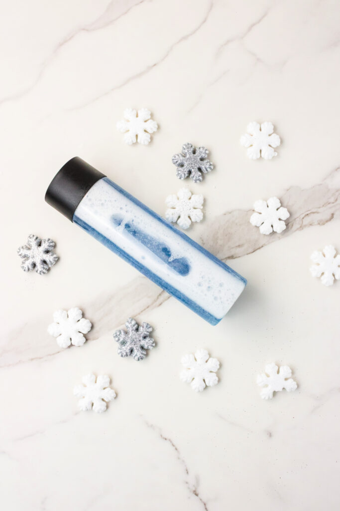 Blue sensory bottle with snowflakes